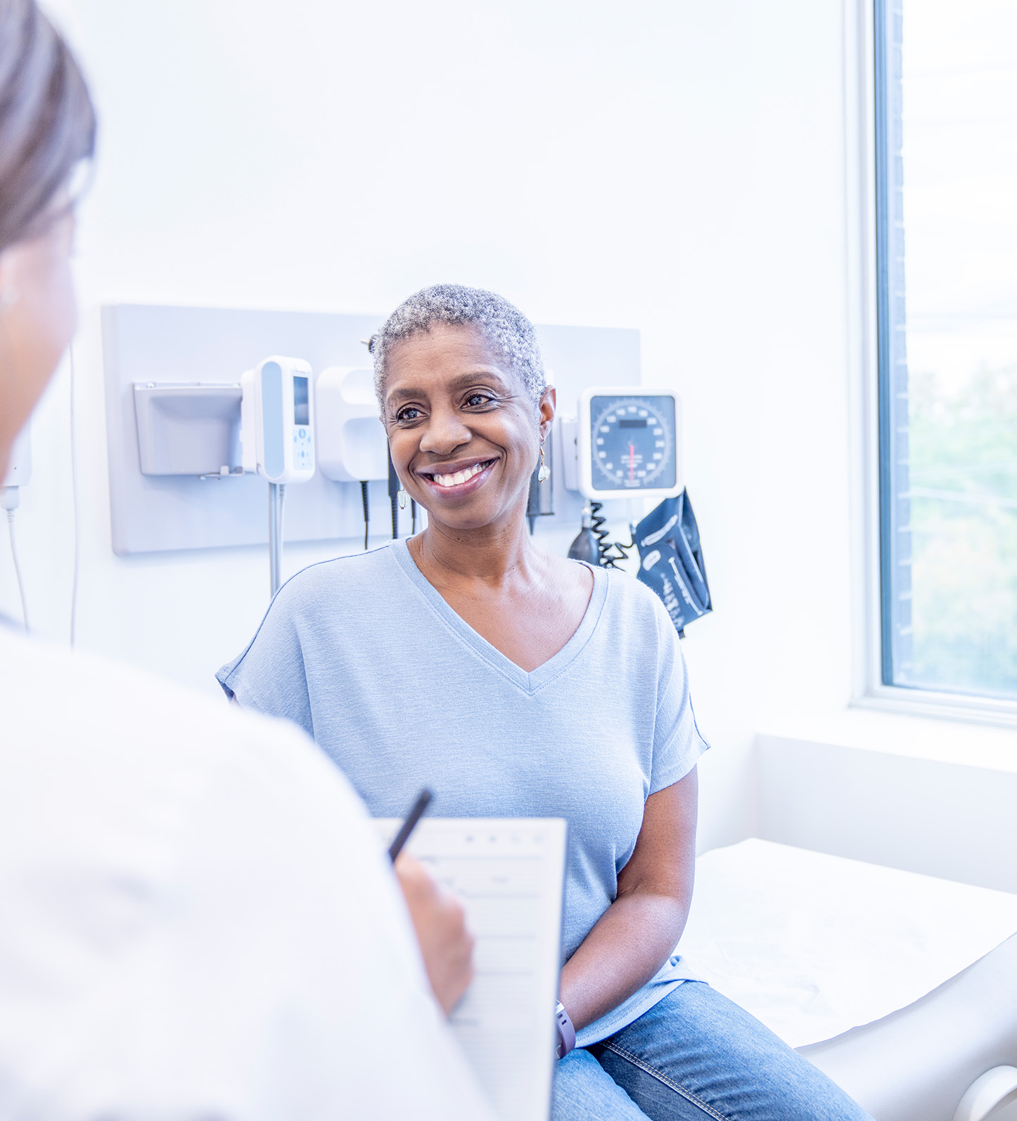 Image of a female patient and doctor